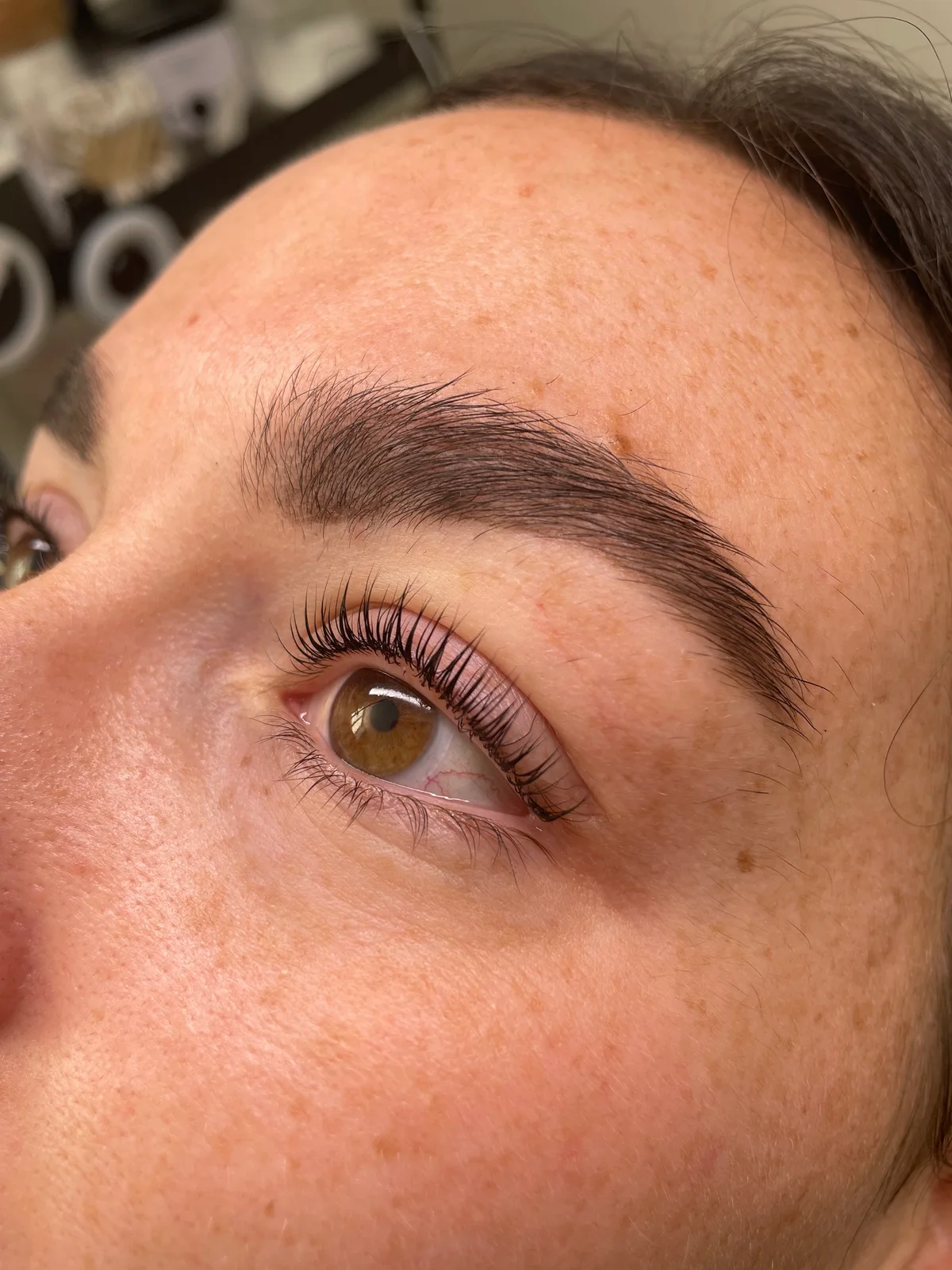 Defined brows and lifted lashes, photographed after the appointment